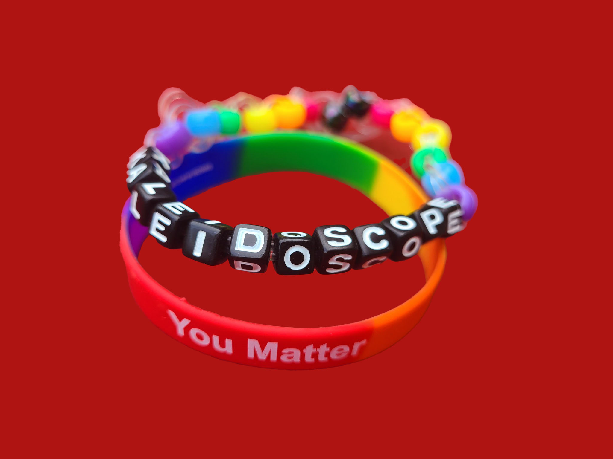 bracelet with beads spelling out Kaleidoscope along with bracelet saying "you matter"